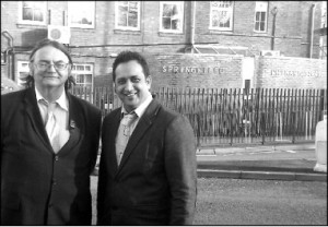 Councillors Jerry Evans and Tanveer Choudhry outside one of the many local schools which will benefit